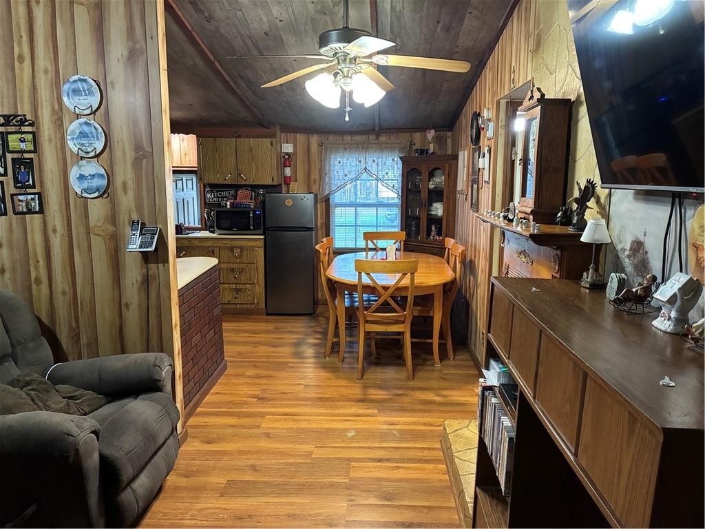 244 Manors Mill Road Dallas, GA 30157 - Photo 3 of 39 a living room with stainless steel appliances kitchen island granite countertop furniture and a kitchen view