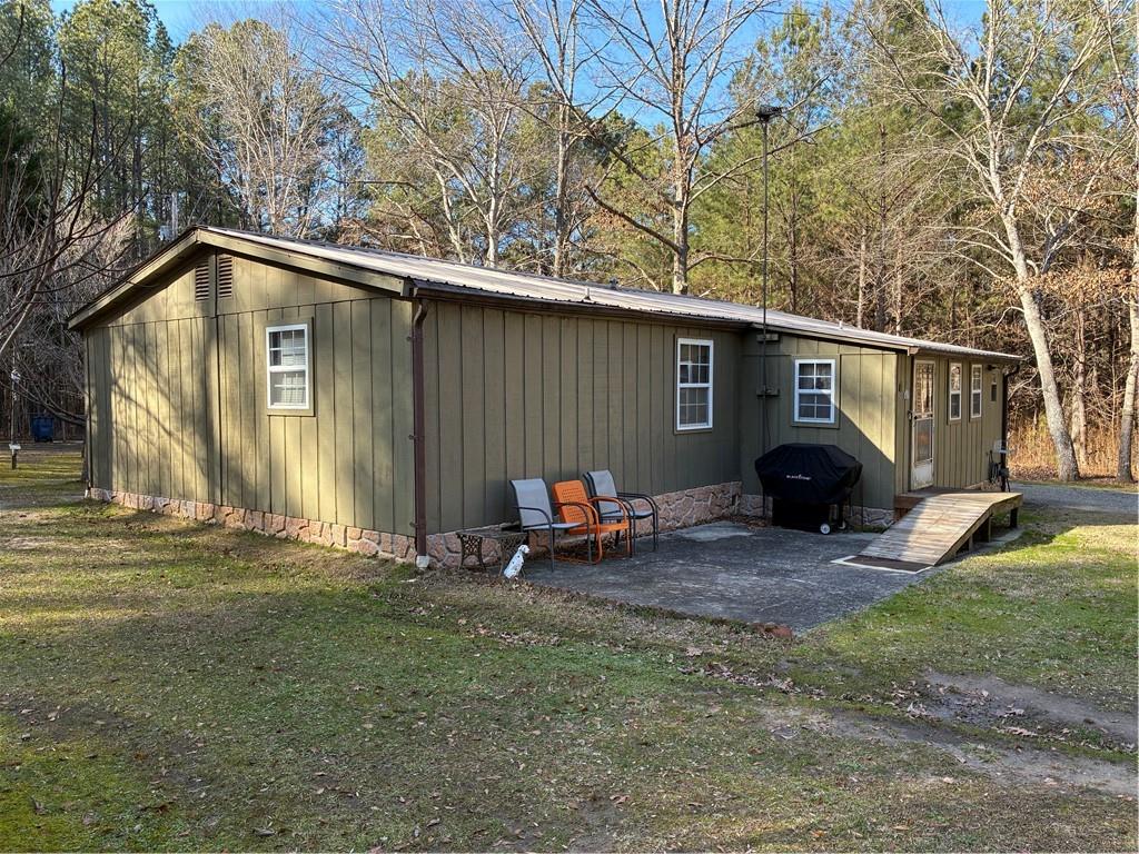 244 Manors Mill Road Dallas, GA 30157 - Photo 33 of 39 a view of a house with backyard