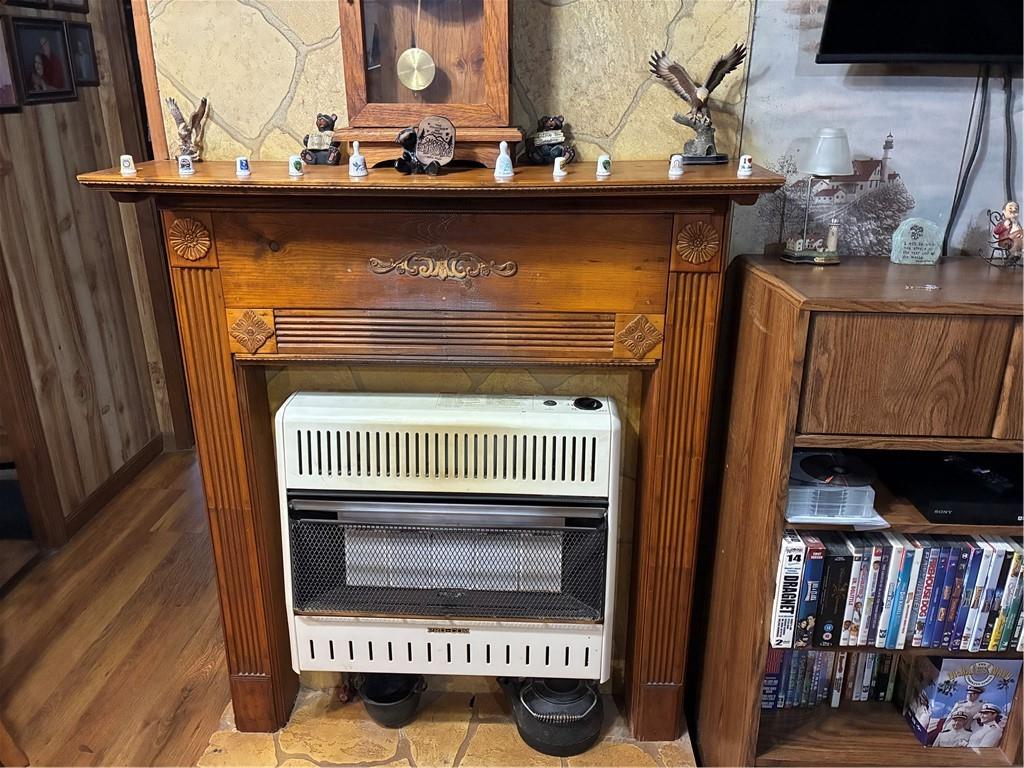 244 Manors Mill Road Dallas, GA 30157 - Photo 7 of 39 a view of a livingroom with furniture and a book shelf