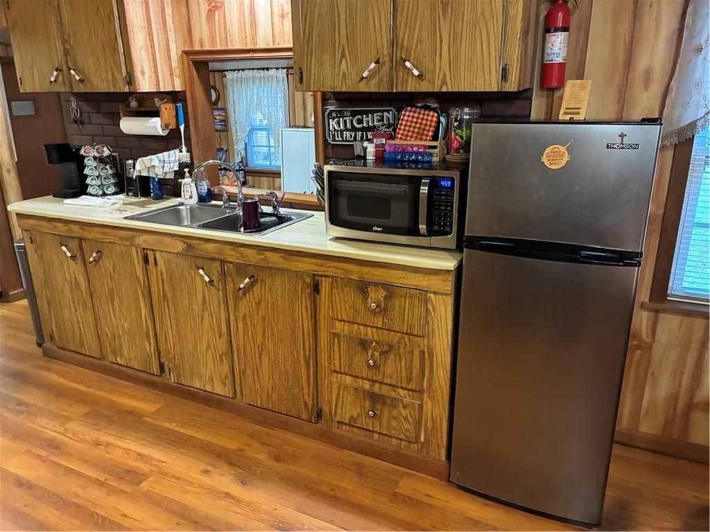 244 Manors Mill Road Dallas, GA 30157 - Photo 8 of 39 a kitchen with stainless steel appliances a refrigerator and a stove