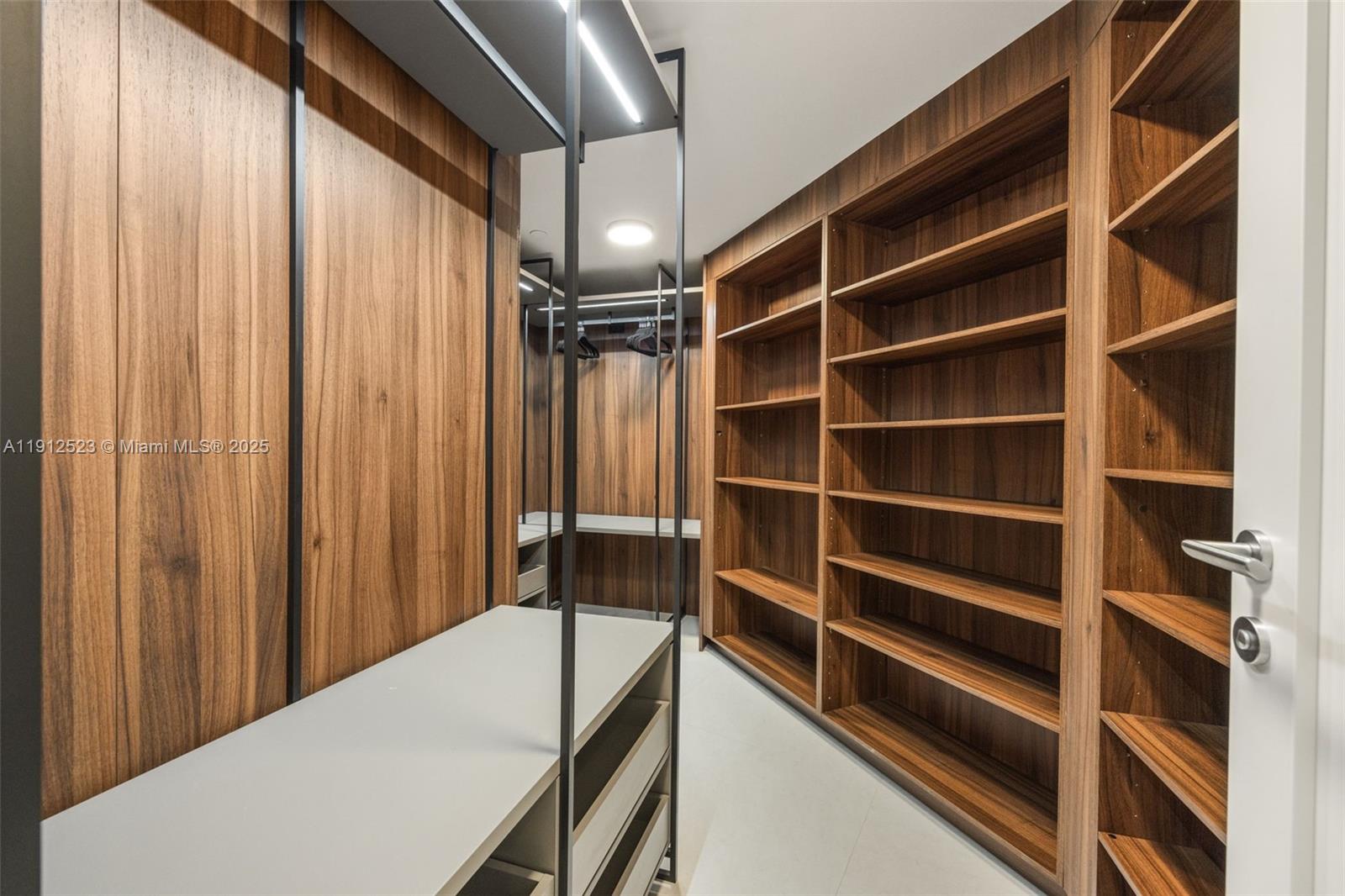 450 Alton Road, Unit 2007 Miami Beach, FL 33139 - Photo 18 of 30 a view of a walk in closet