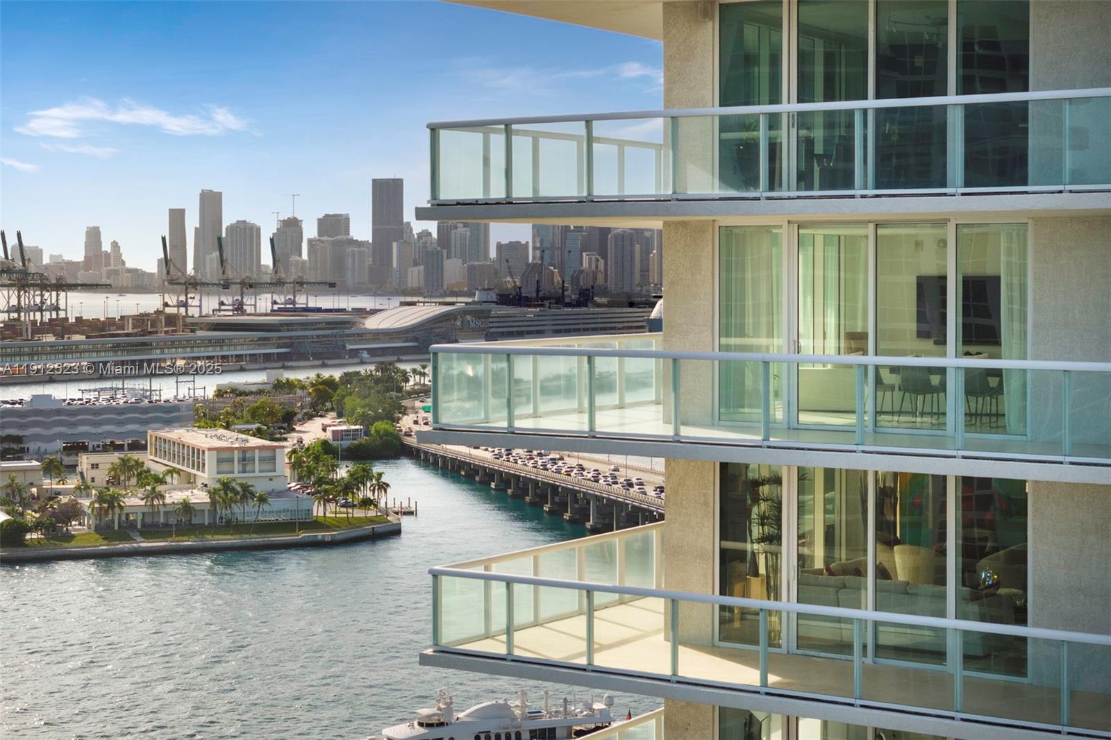 450 Alton Road, Unit 2007 Miami Beach, FL 33139 - Photo 24 of 30 a view of a lake with a tall building