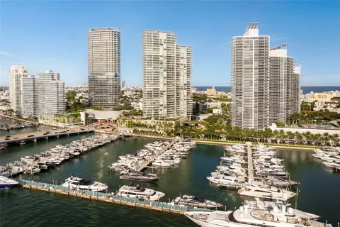 a view of a city with tall buildings