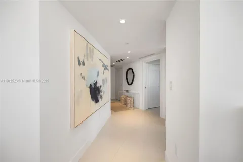 a view of a hallway view with furniture