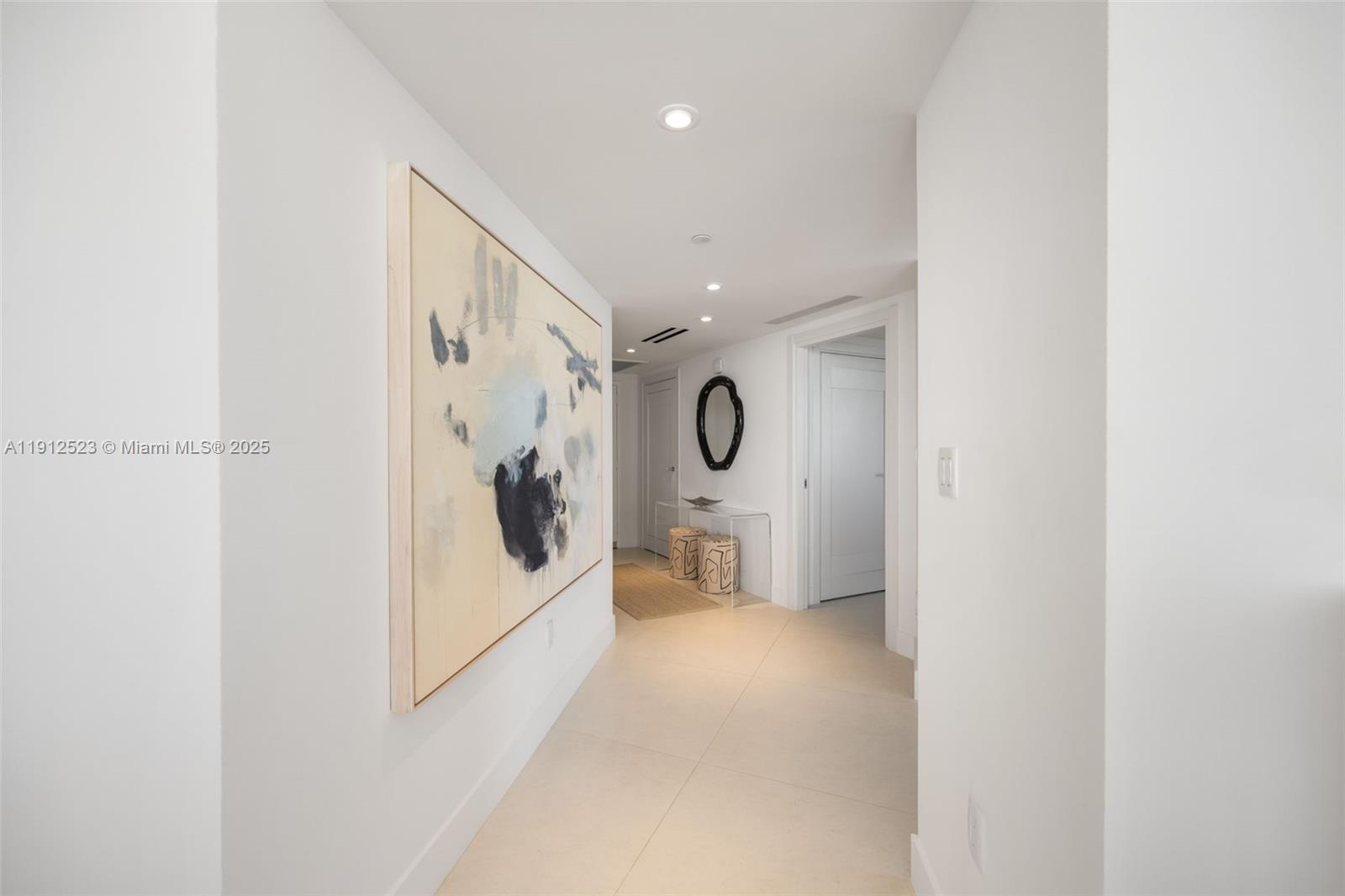 450 Alton Road, Unit 2007 Miami Beach, FL 33139 - Photo 8 of 30 a view of a hallway view with furniture