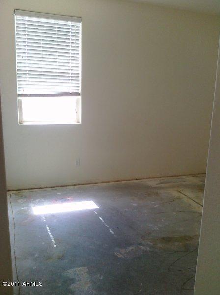 6857 West Carter Road Laveen, AZ 85339 - Photo 15 of 19 downstairs bedroom