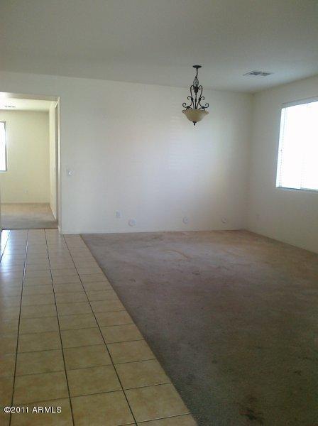6857 West Carter Road Laveen, AZ 85339 - Photo 9 of 19 living/dining room