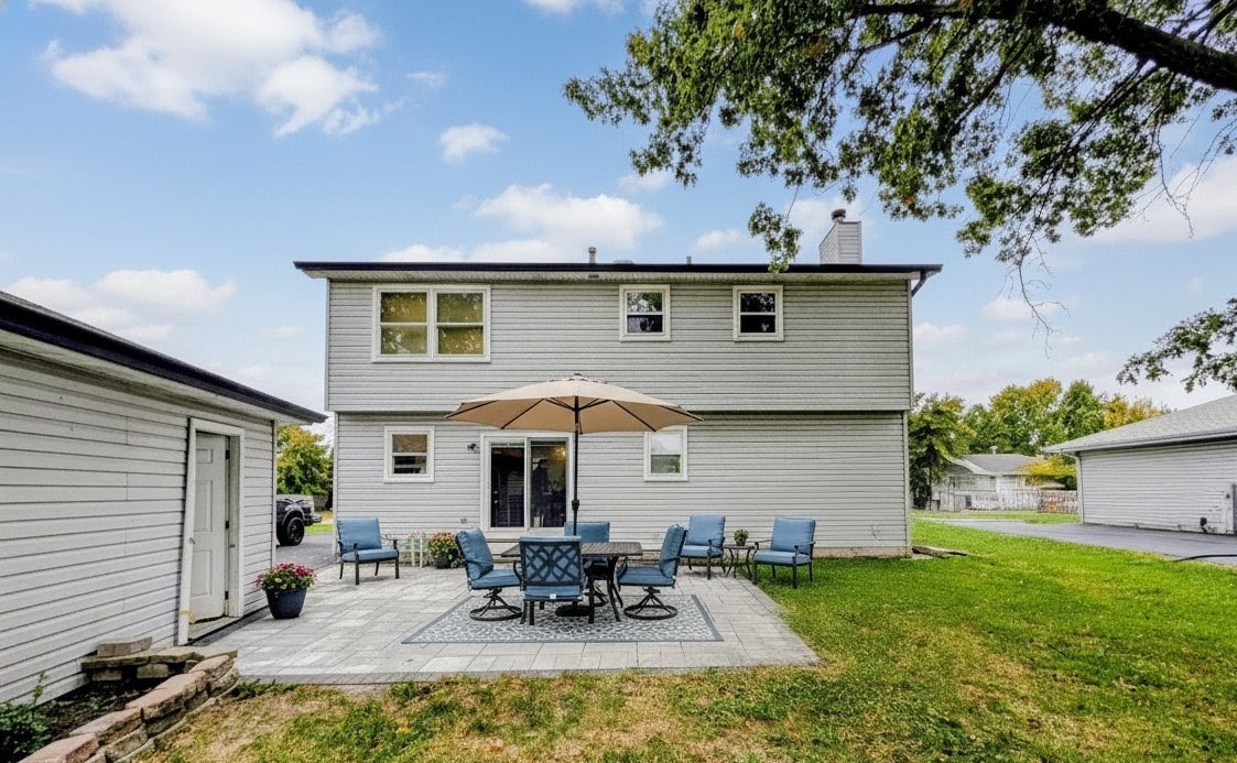 3605 Juniper Avenue Joliet, IL 60431 - Photo 3 of 18 a view of a house with patio