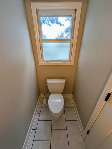 a bathroom with a toilet