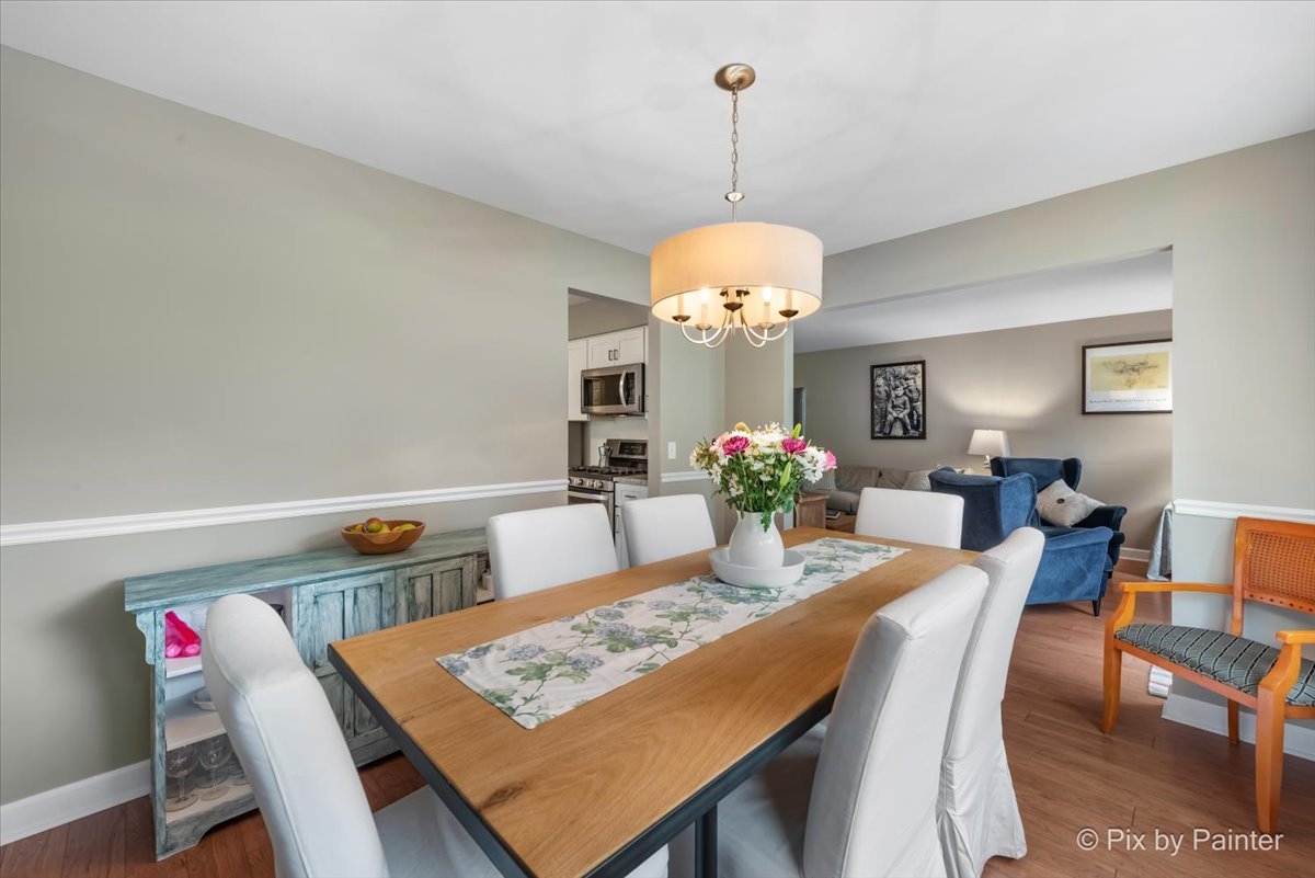 1025 Oswego Road Naperville, IL 60540 - Photo 10 of 42 a view of a dining room with furniture
