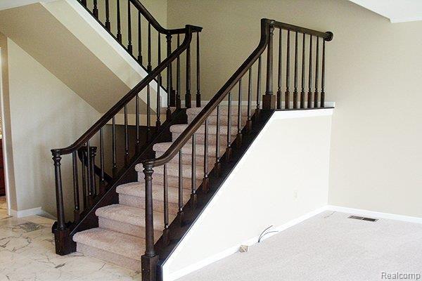 934 Golfview Court, Unit 22 Rochester, MI 48307 - Photo 10 of 21 Stairway to finished W/O LL
