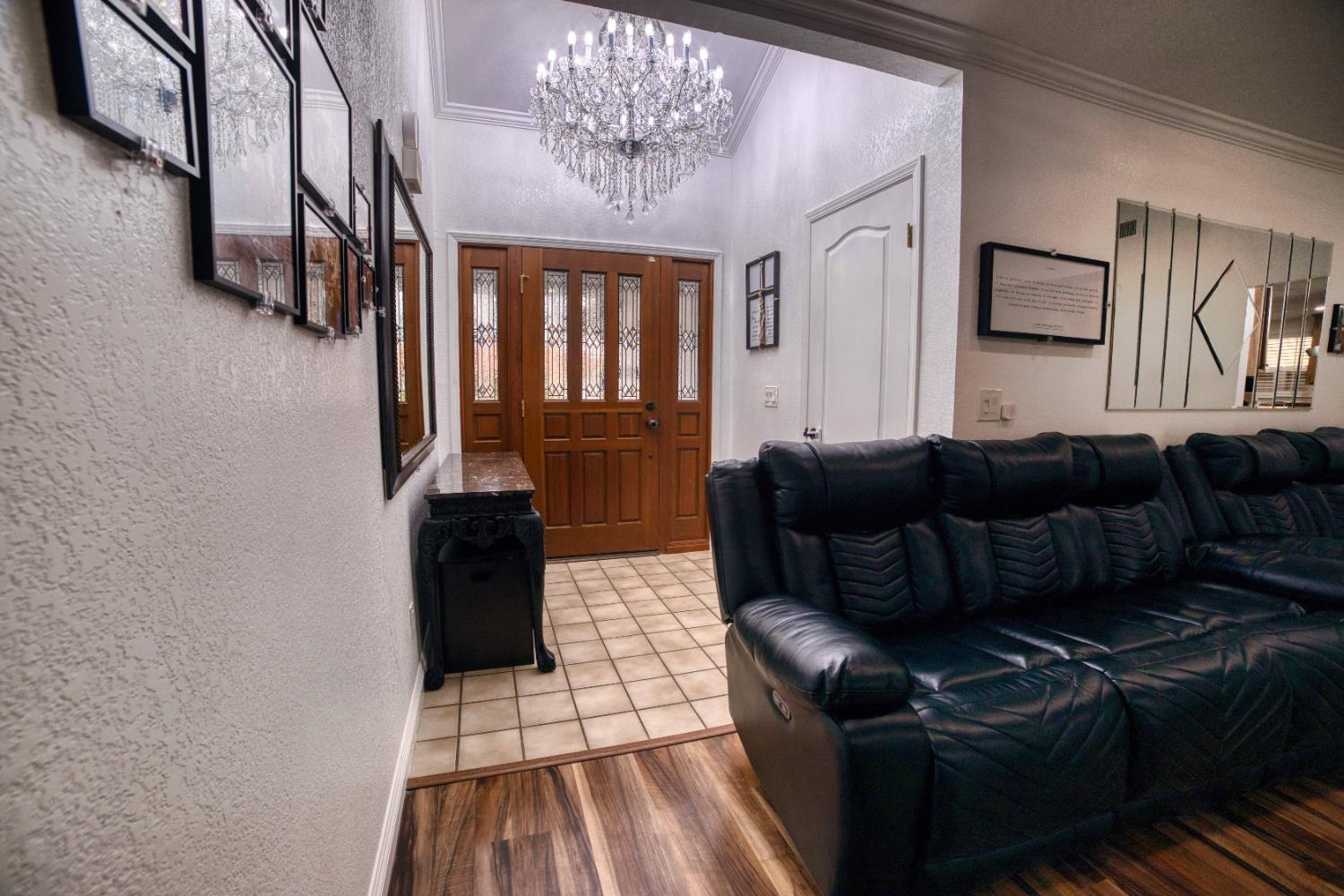 2520 Meadowrest Way Madera, CA 93637 - Photo 14 of 39 a living room with furniture and a fireplace