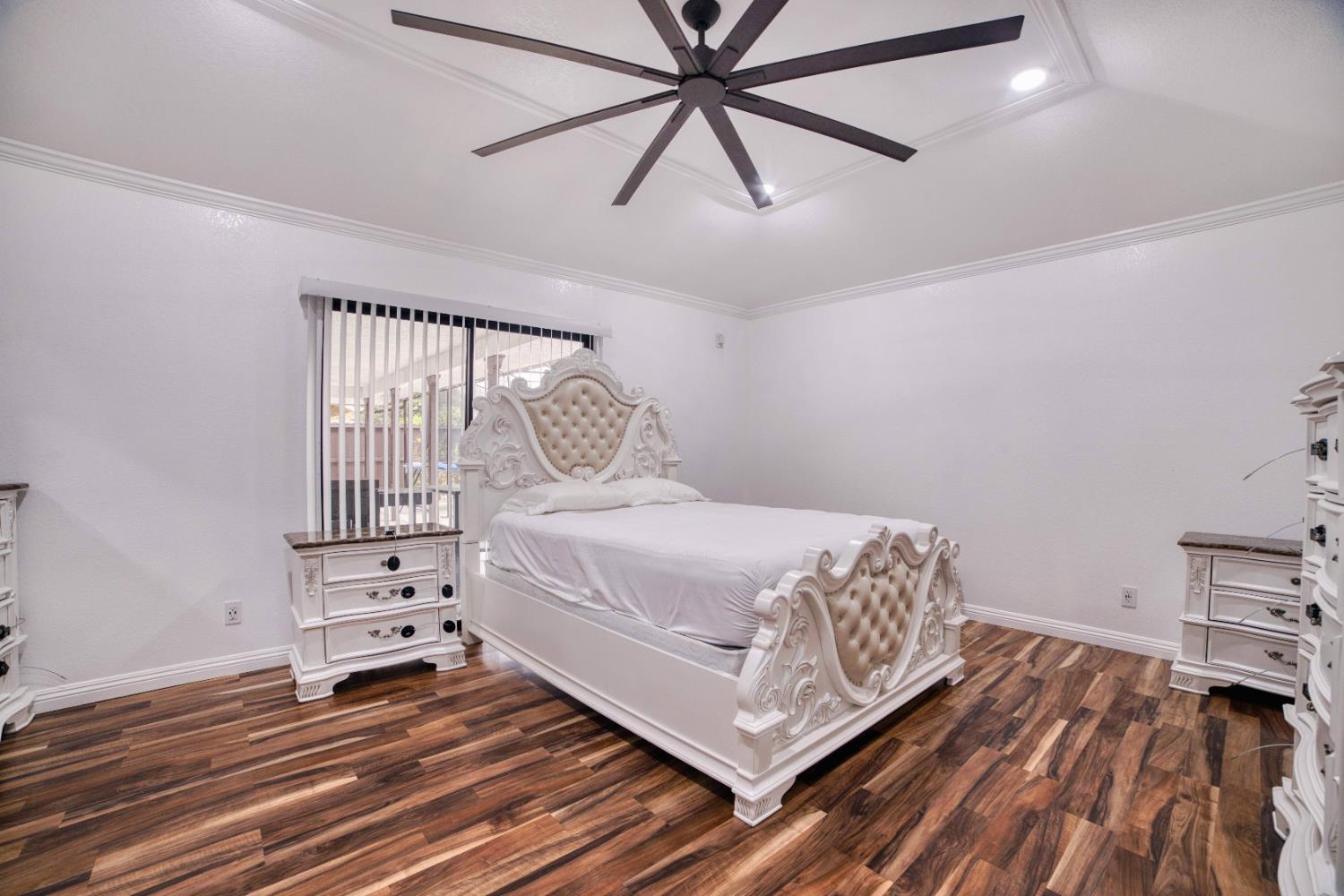 2520 Meadowrest Way Madera, CA 93637 - Photo 28 of 39 a bedroom with a bed and a window