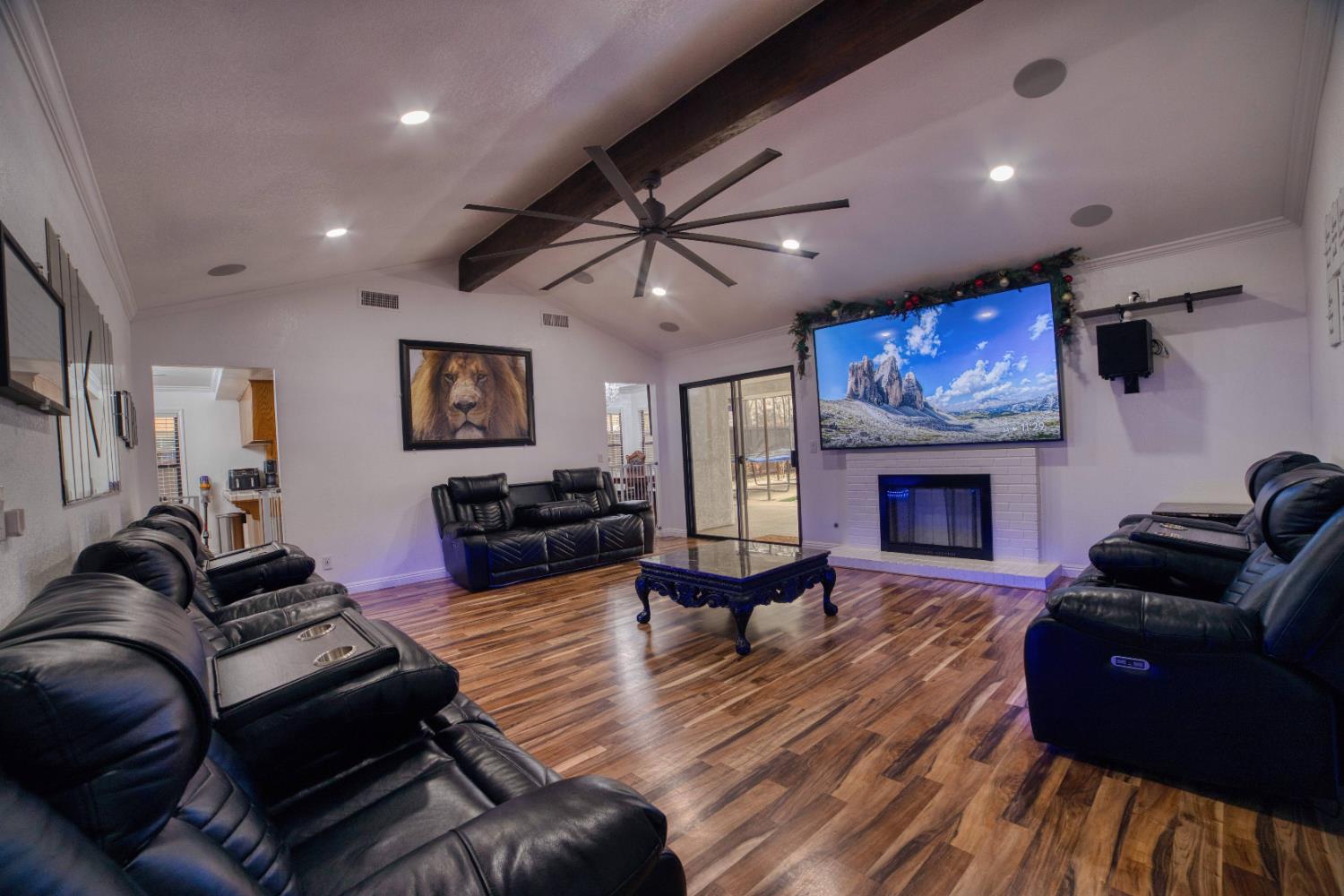 2520 Meadowrest Way Madera, CA 93637 - Photo 31 of 39 a living room with furniture fireplace and flat screen tv