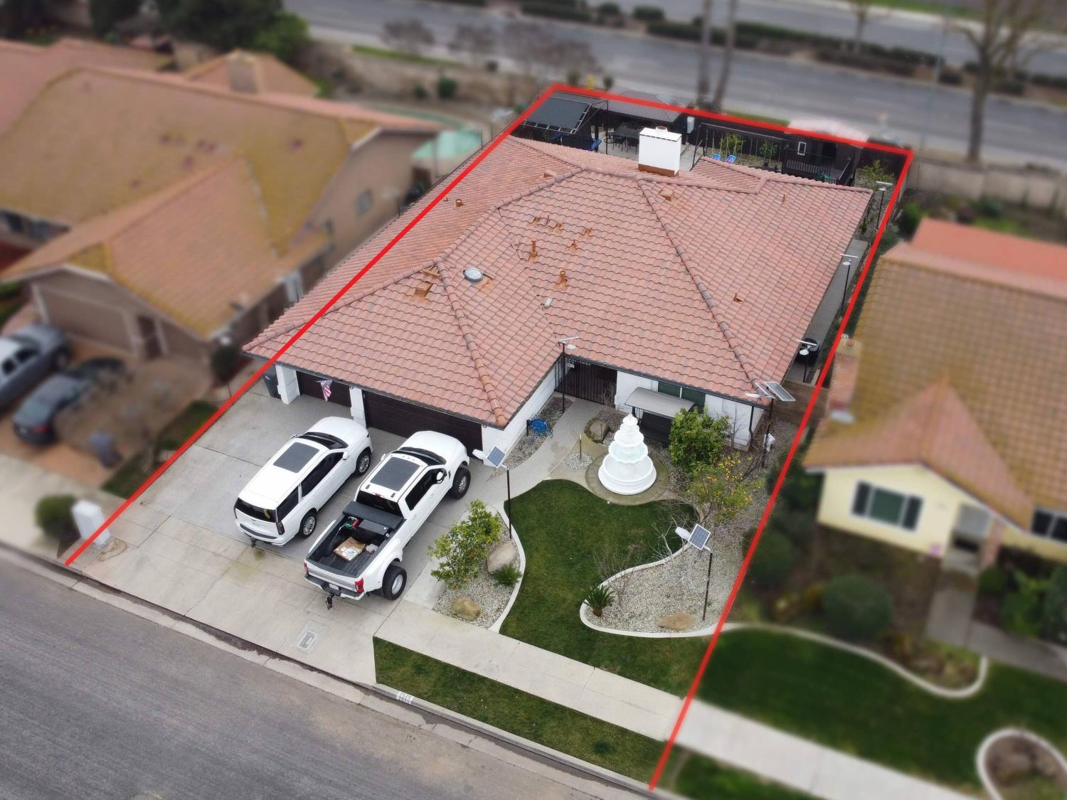 2520 Meadowrest Way Madera, CA 93637 - Photo 39 of 39 an aerial view of a house with garden space and street view