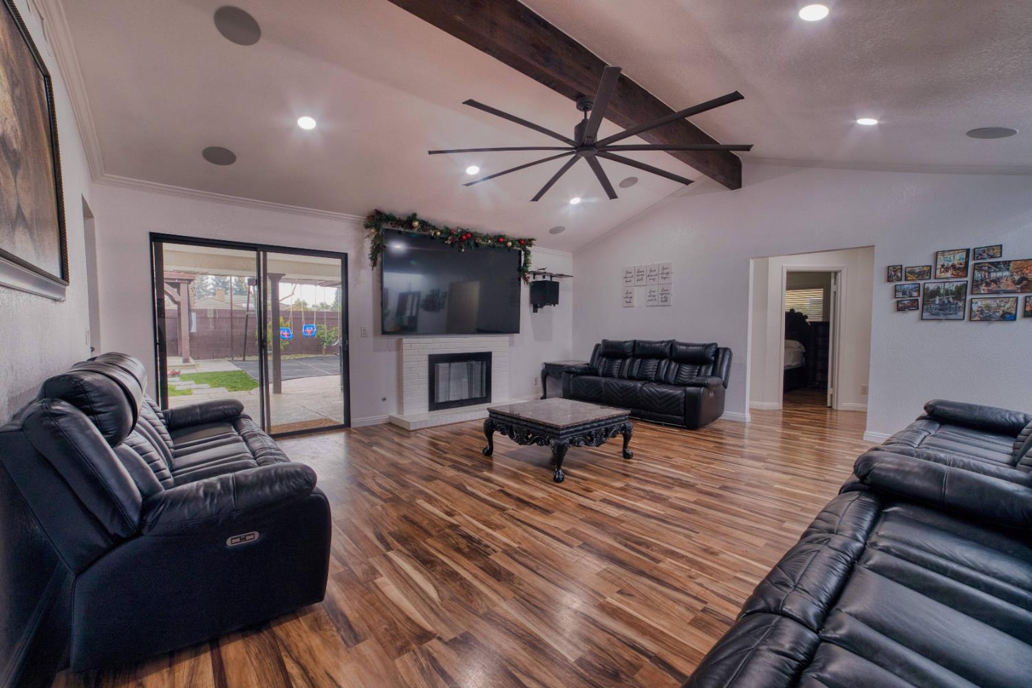 2520 Meadowrest Way Madera, CA 93637 - Photo 5 of 39 a living room with furniture and a fireplace