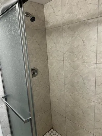 a view of a room with a large window