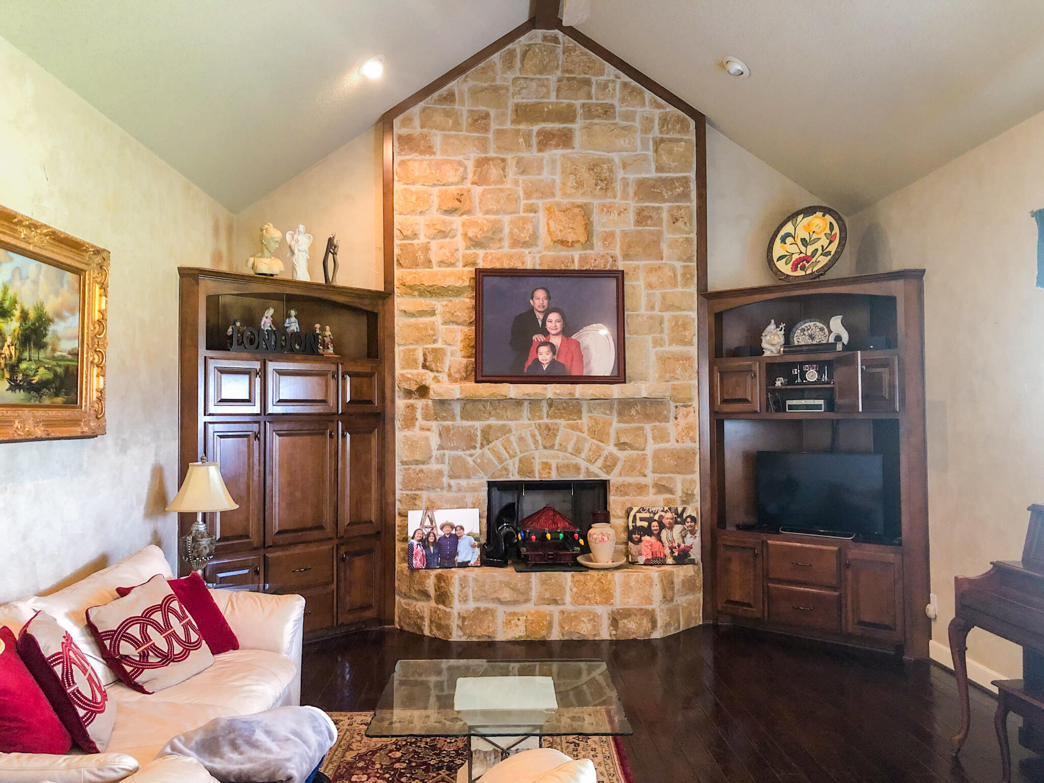 5502 156th Street Lubbock, TX 79424 - Photo 15 of 37 a living room with furniture and a fireplace