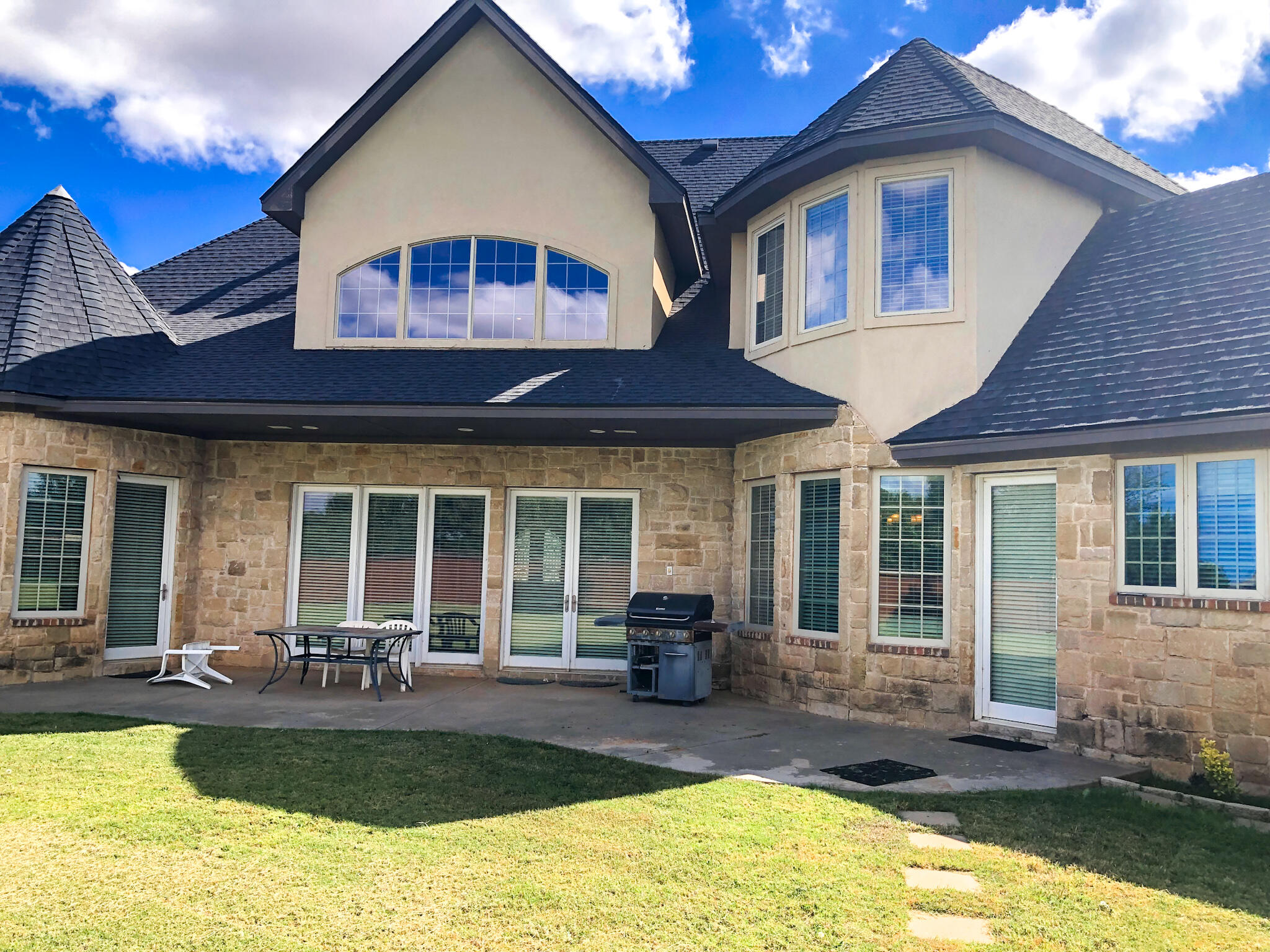 5502 156th Street Lubbock, TX 79424 - Photo 34 of 37 a view of a house with swimming pool patio and a yard