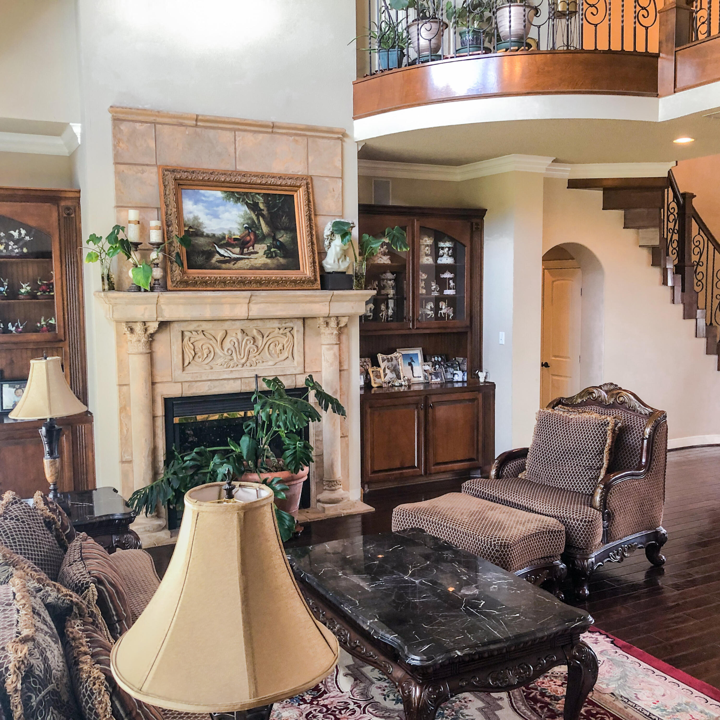 5502 156th Street Lubbock, TX 79424 - Photo 6 of 37 a living room with furniture and a fireplace