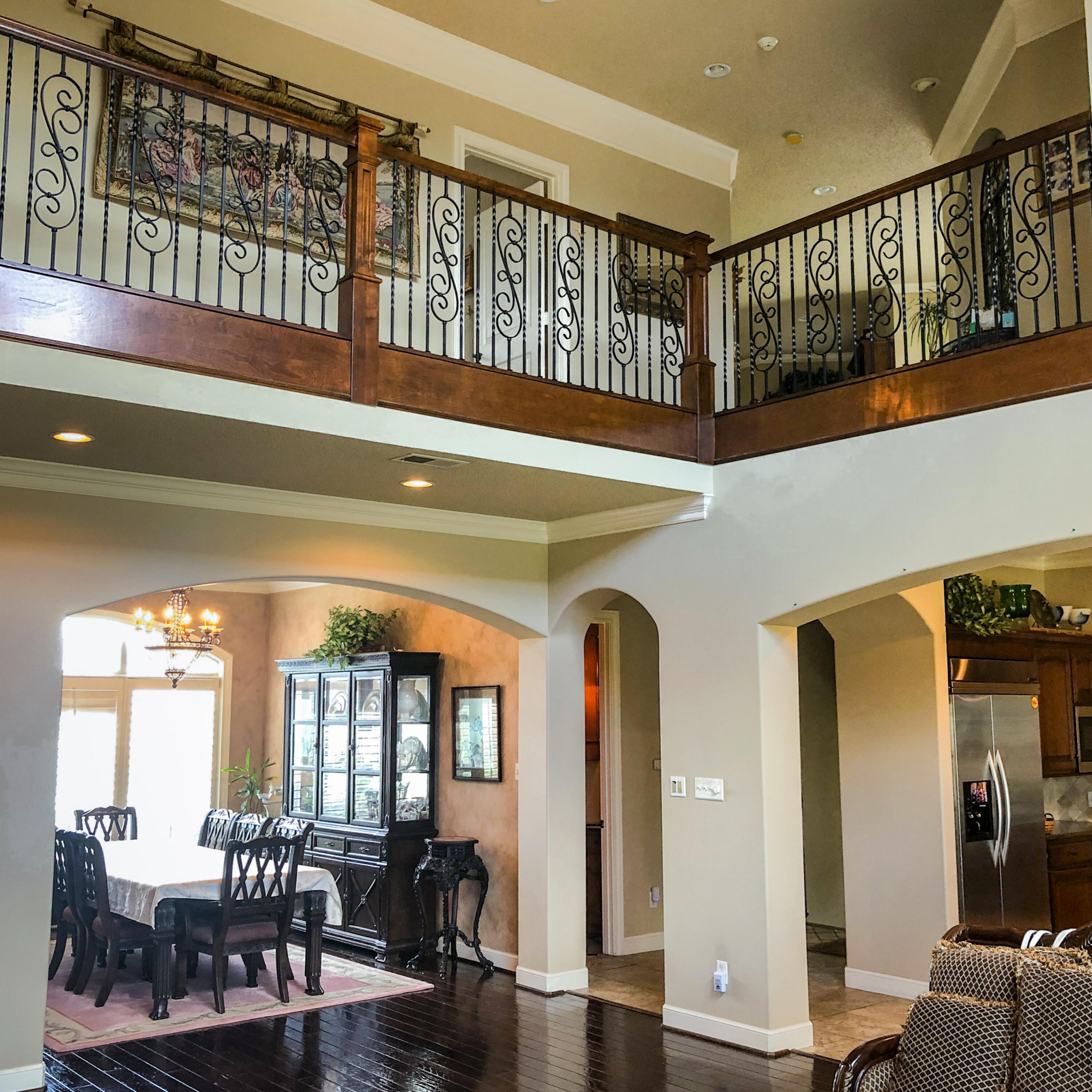 5502 156th Street Lubbock, TX 79424 - Photo 8 of 37 a view of entryway livingroom and hall with wooden floor