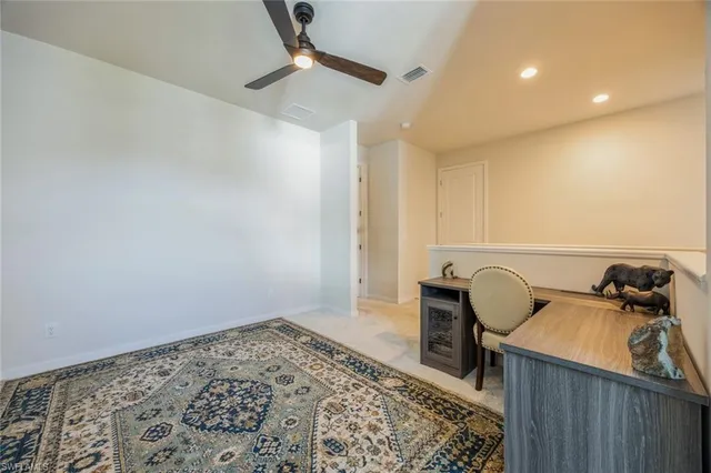 a view of a storage & utility room with two washing machine
