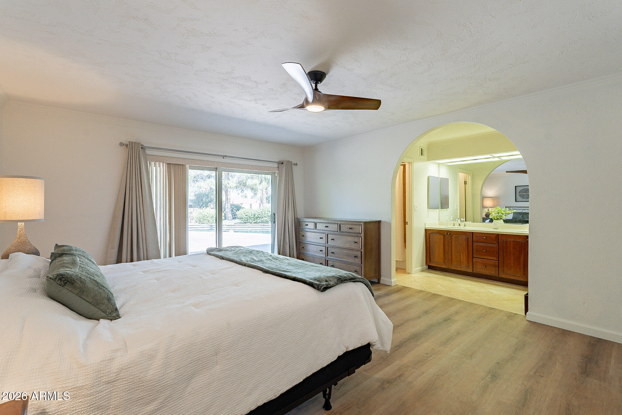 4226 East North Lane Phoenix, AZ 85028 - Photo 25 of 43 a bedroom with a bed and a large window