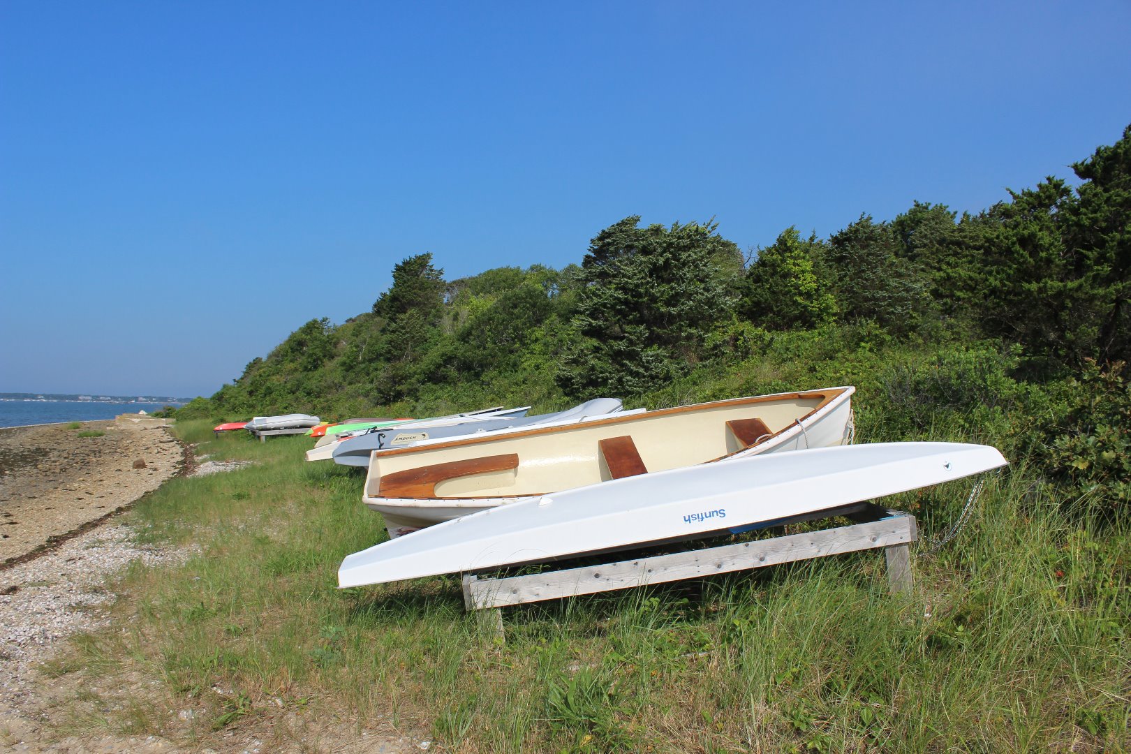 37-39 Jeremiah Road Edgartown, MA 02539 - Photo 11 of 11 a backyard of a house with lots of green space