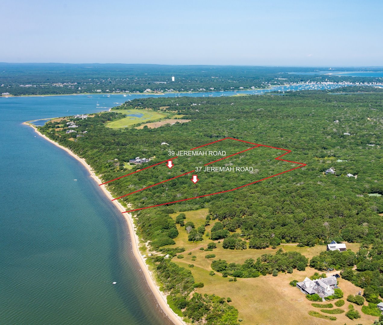 37-39 Jeremiah Road Edgartown, MA 02539 - Photo 4 of 11 a view of a lake with a city
