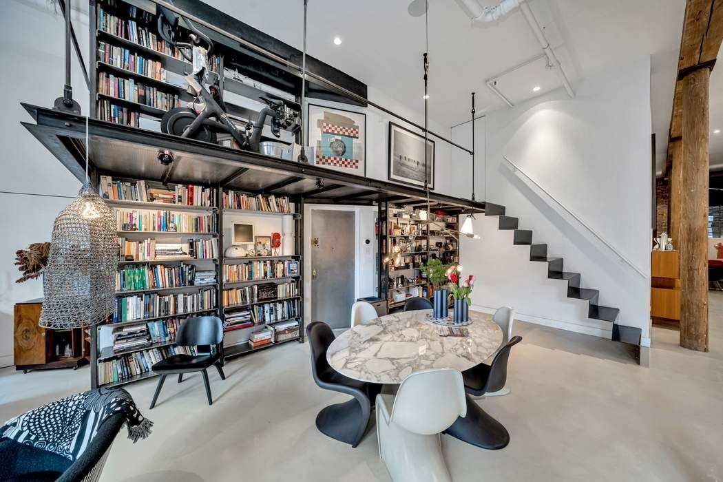 876 Broadway, Unit 3 Manhattan, NY 10003 - Photo 5 of 13 a view of a chairs and table in a room