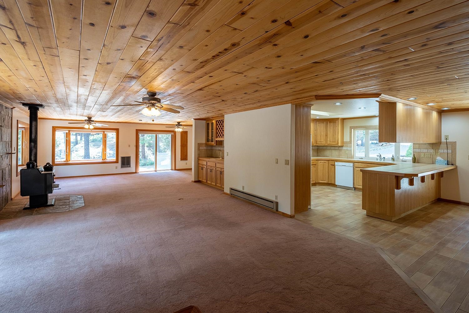 99 Catfish Lane Calpine, CA 96124 - Photo 11 of 21 a view of a livingroom with furniture and a kitchen