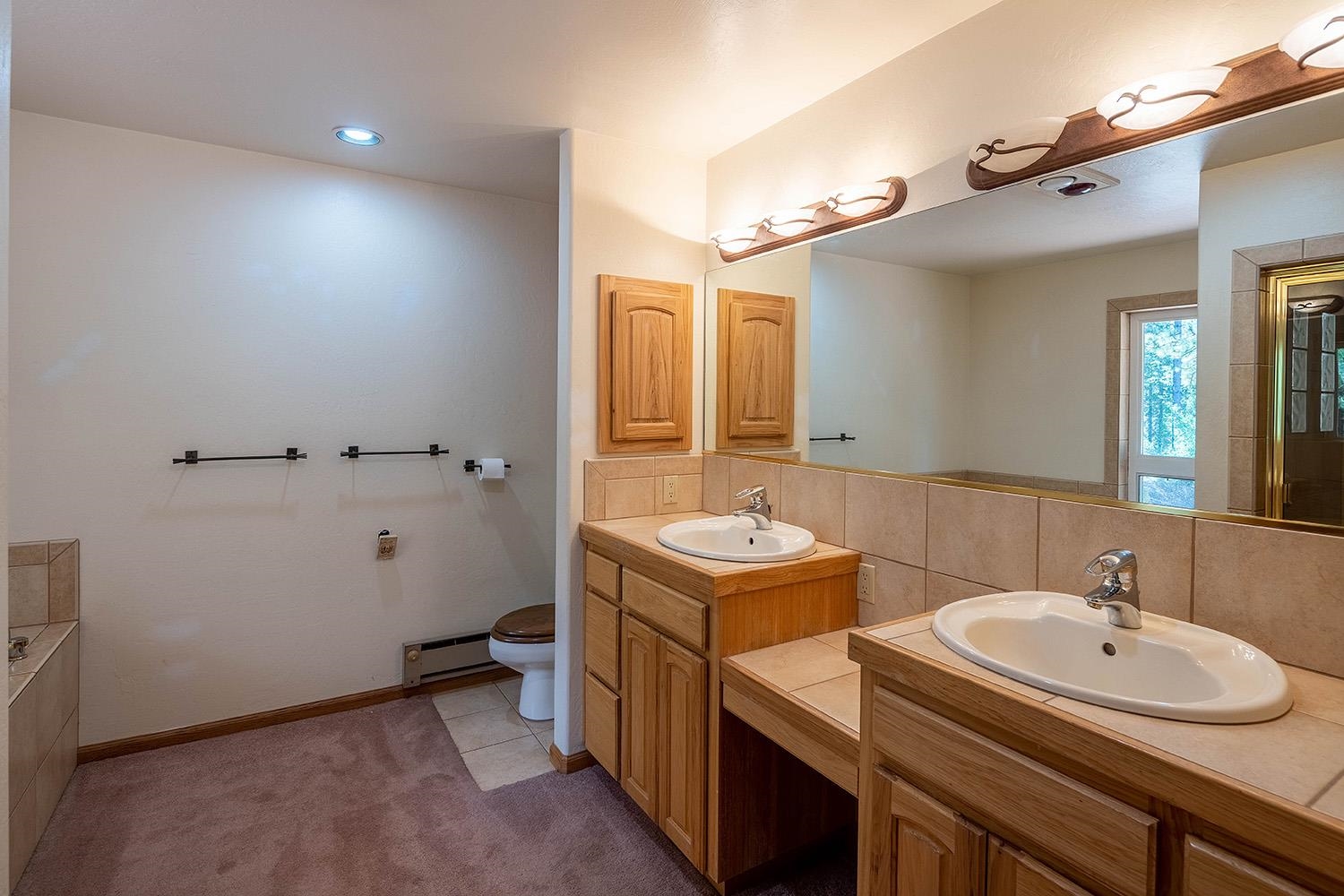 99 Catfish Lane Calpine, CA 96124 - Photo 14 of 21 a bathroom with a sink and a mirror