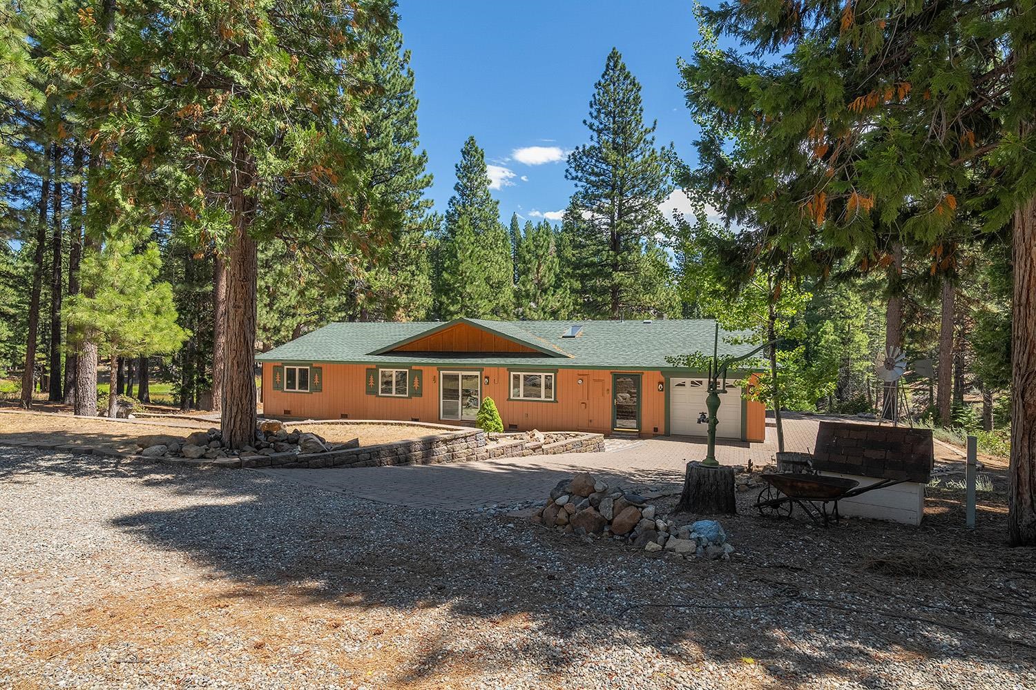 99 Catfish Lane Calpine, CA 96124 - Photo 8 of 21 a white house that has a tree in front of it