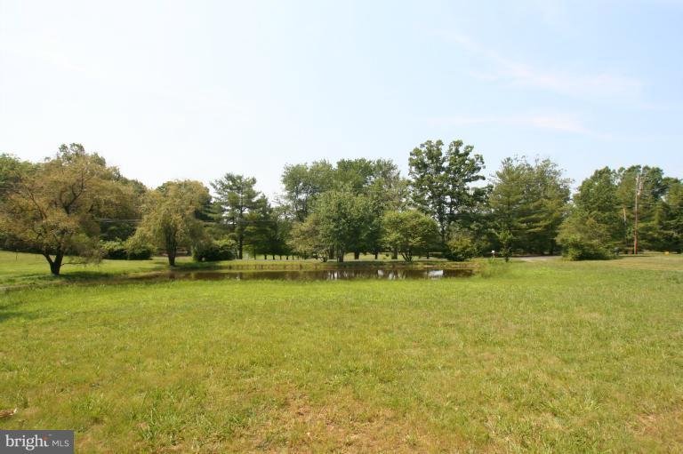 4090 Goldmine Road Goldvein, VA 22720 - Photo 4 of 18 Pond & Front Lawn