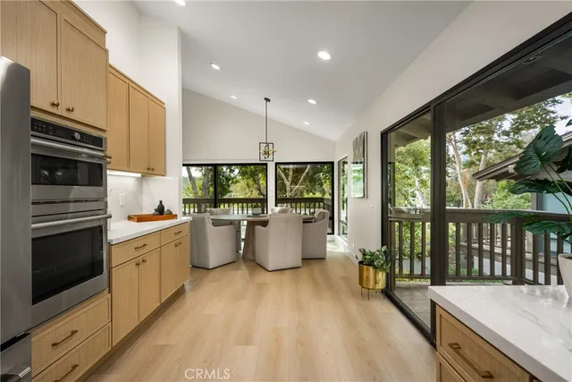 a view of a balcony with trees