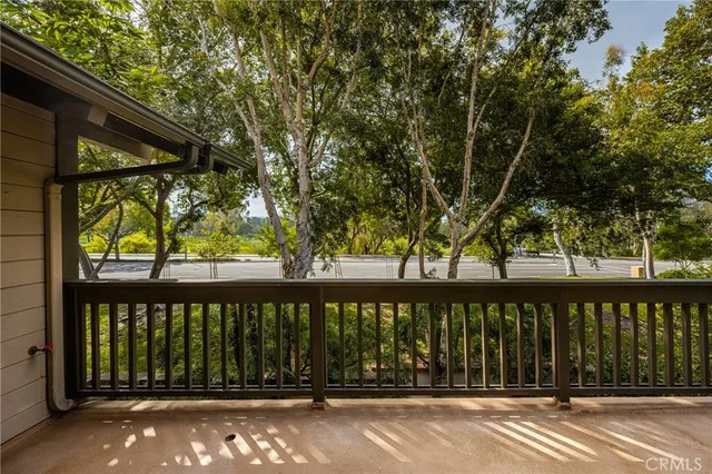 a bathroom with a sink toilet and mirror