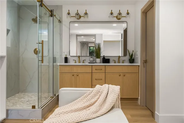 a bathroom with a bathtub and a shower