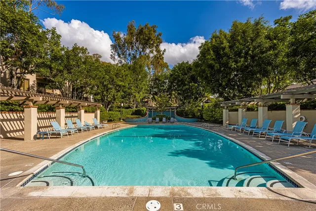 a view of outdoor space with signage and flags