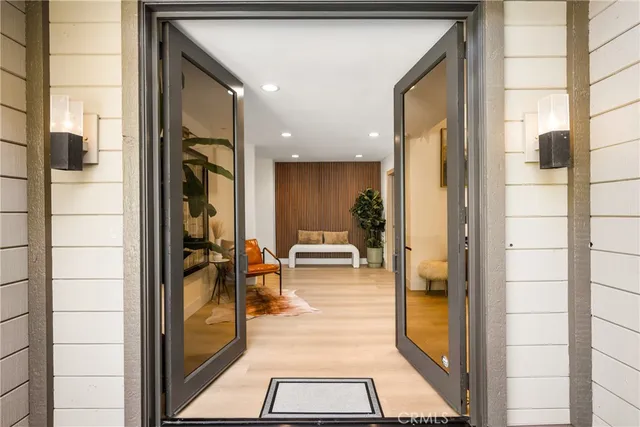 a view of livingroom with furniture and floor to ceiling window