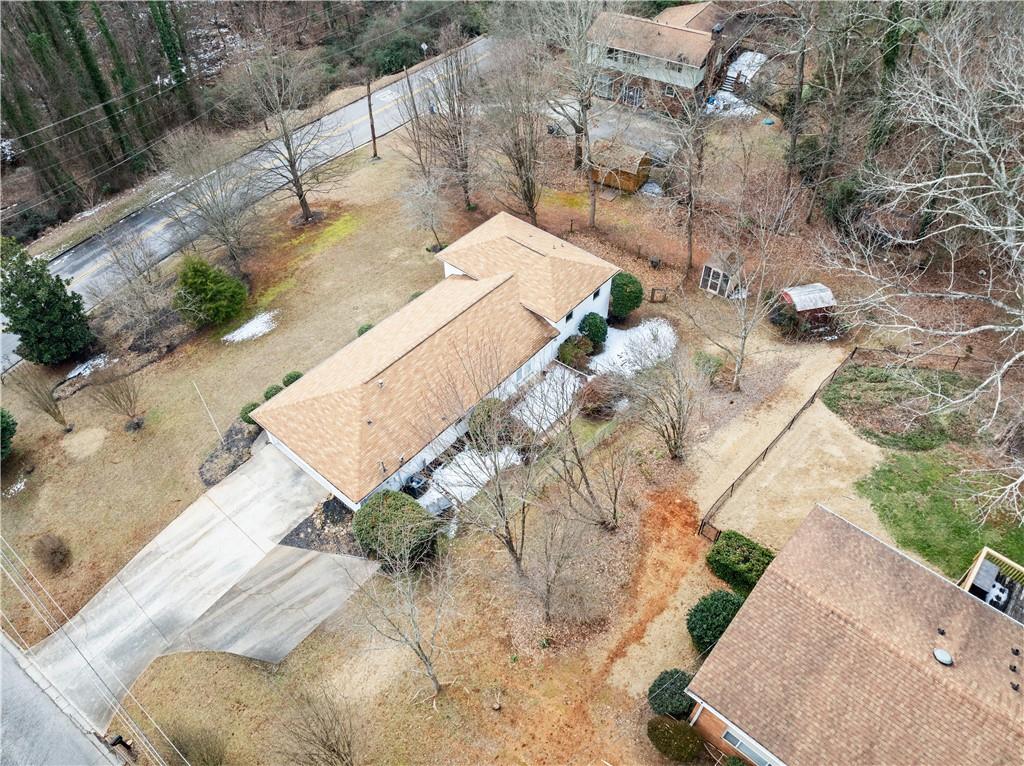 1002 Dixon Drive Gainesville, GA 30501 - Photo 29 of 37 an aerial view of a house with a yard and sitting space