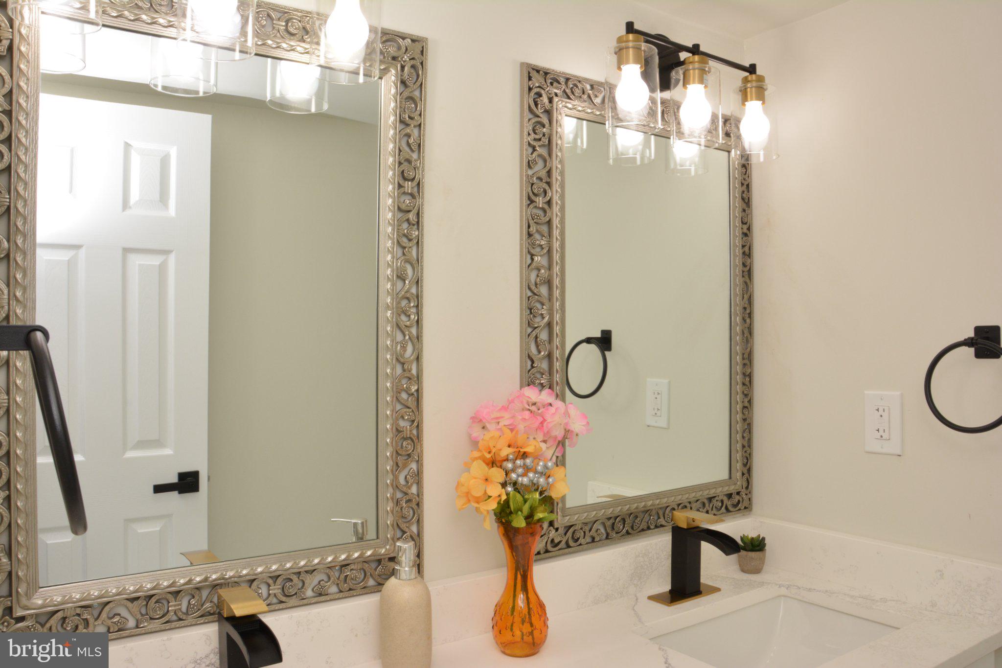 1006 Circle Drive Keymar, MD 21757 - Photo 31 of 45 Elegant dual mirrors in a chic bath.