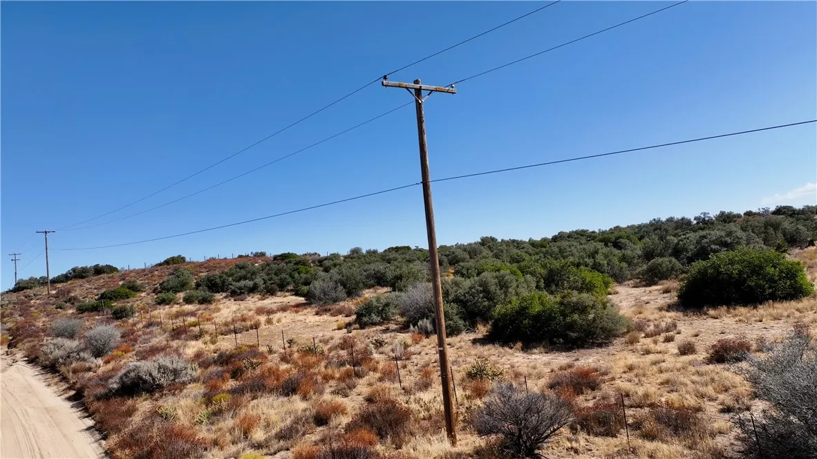 3 Sunset Sage Anza, CA 92539 - Photo 9 of 11 a view of a road with a building in the background