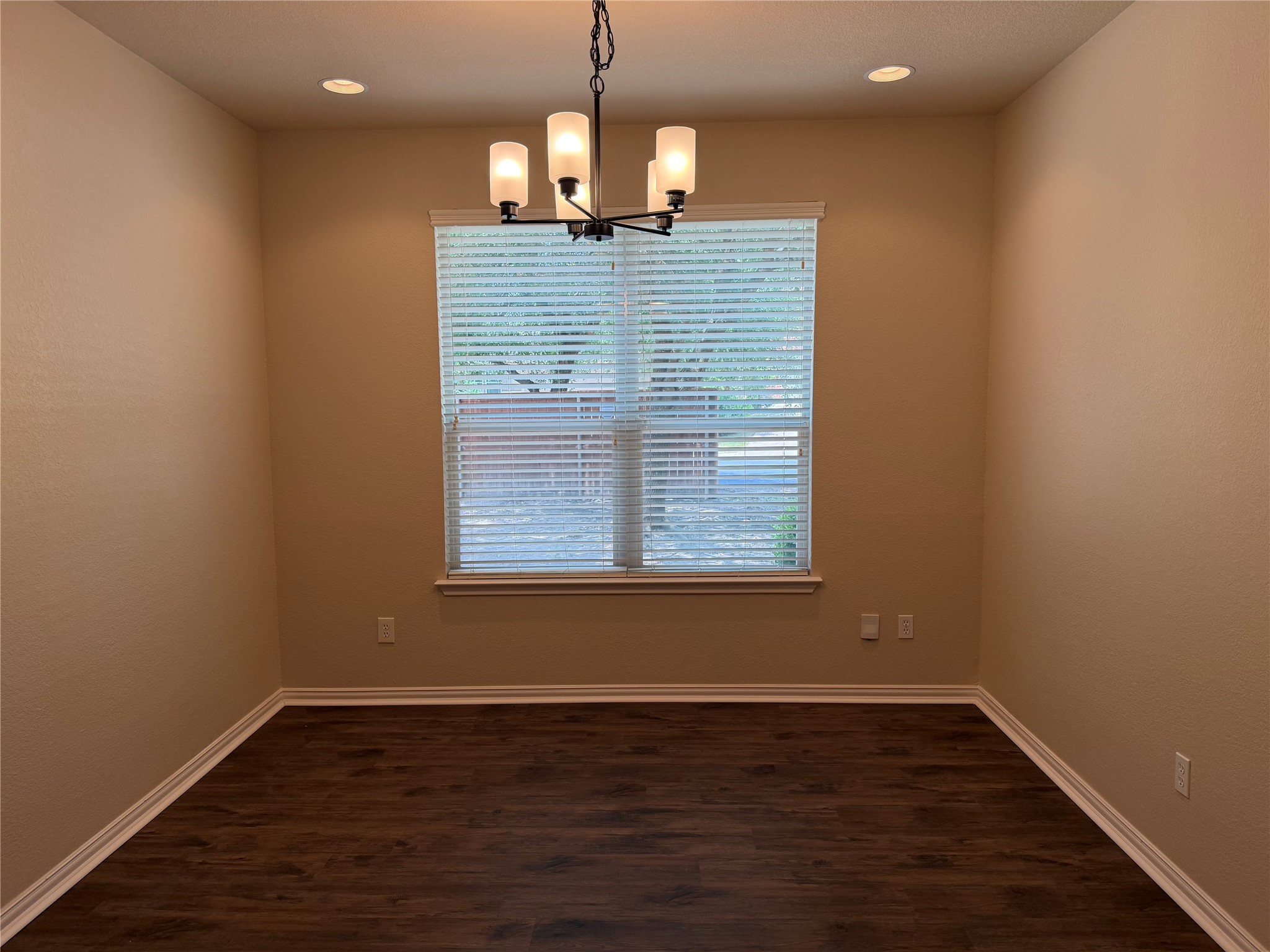 3021 Grand Mission Way Pflugerville, TX 78660 - Photo 5 of 31 A window-filled dining area provides the perfect setting for memorable meals.