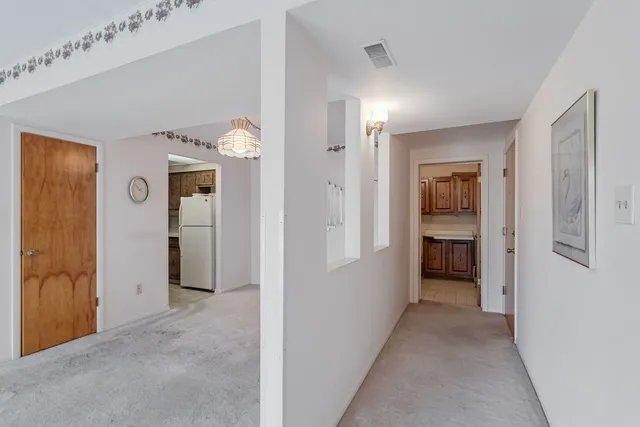 a view of a hallway with entryway