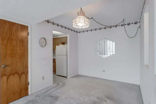 a kitchen with stainless steel appliances a stove a sink and cabinets