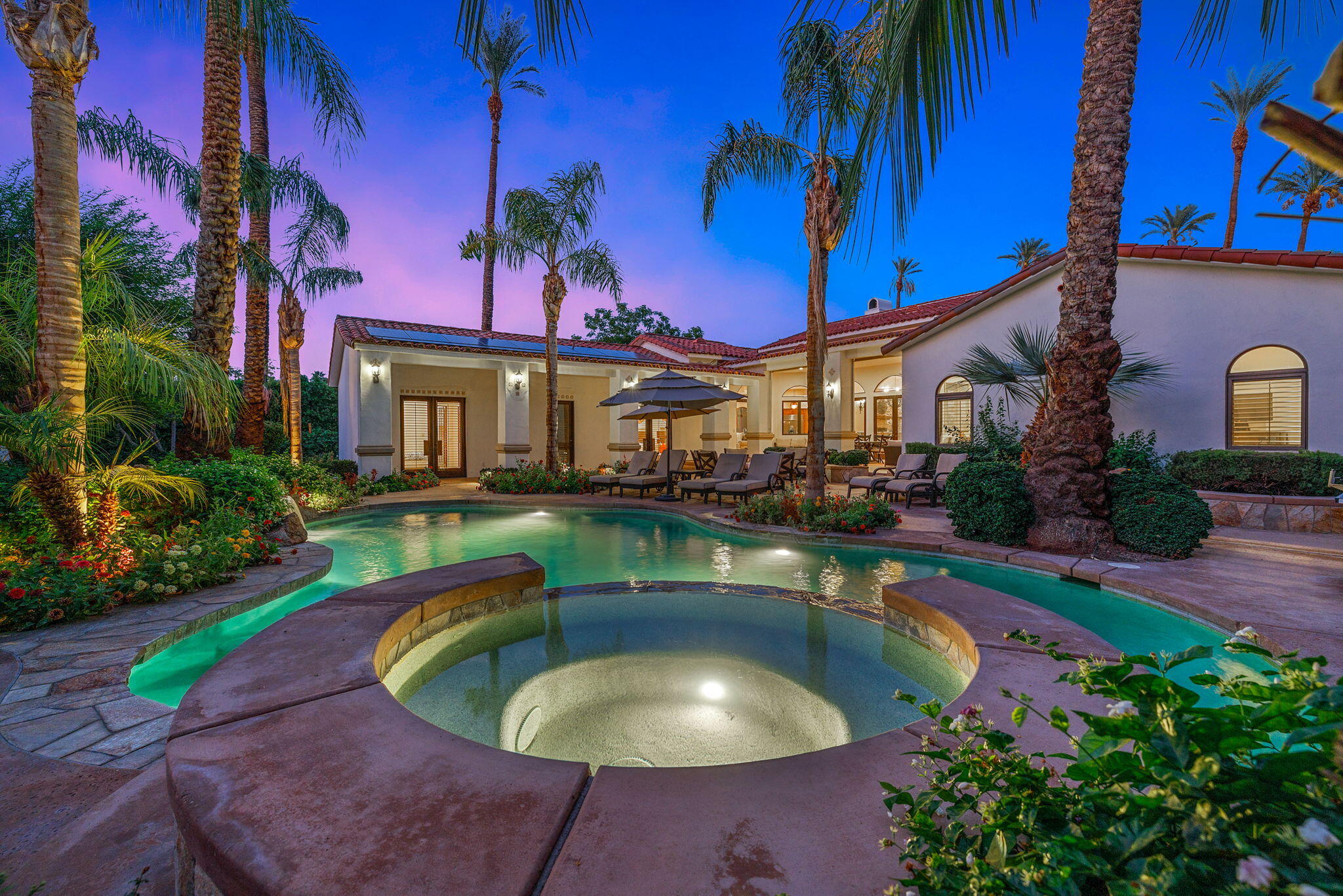 72033 Clancy Lane Rancho Mirage, CA 92270 - Photo 2 of 83 a view of a house with swimming pool