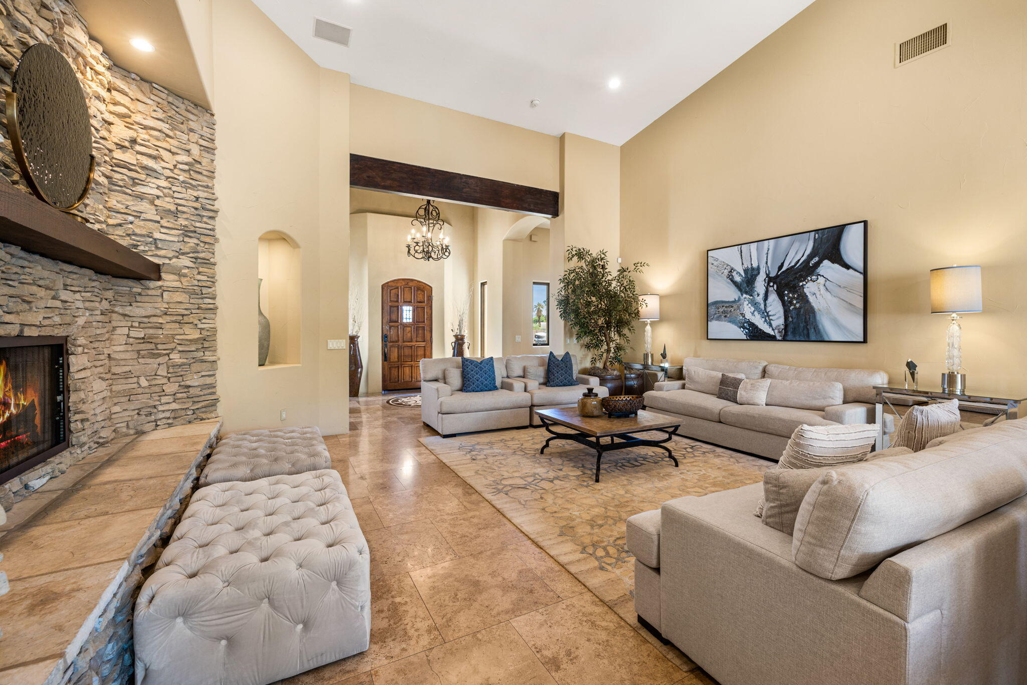 72033 Clancy Lane Rancho Mirage, CA 92270 - Photo 24 of 83 a living room with furniture and a fireplace