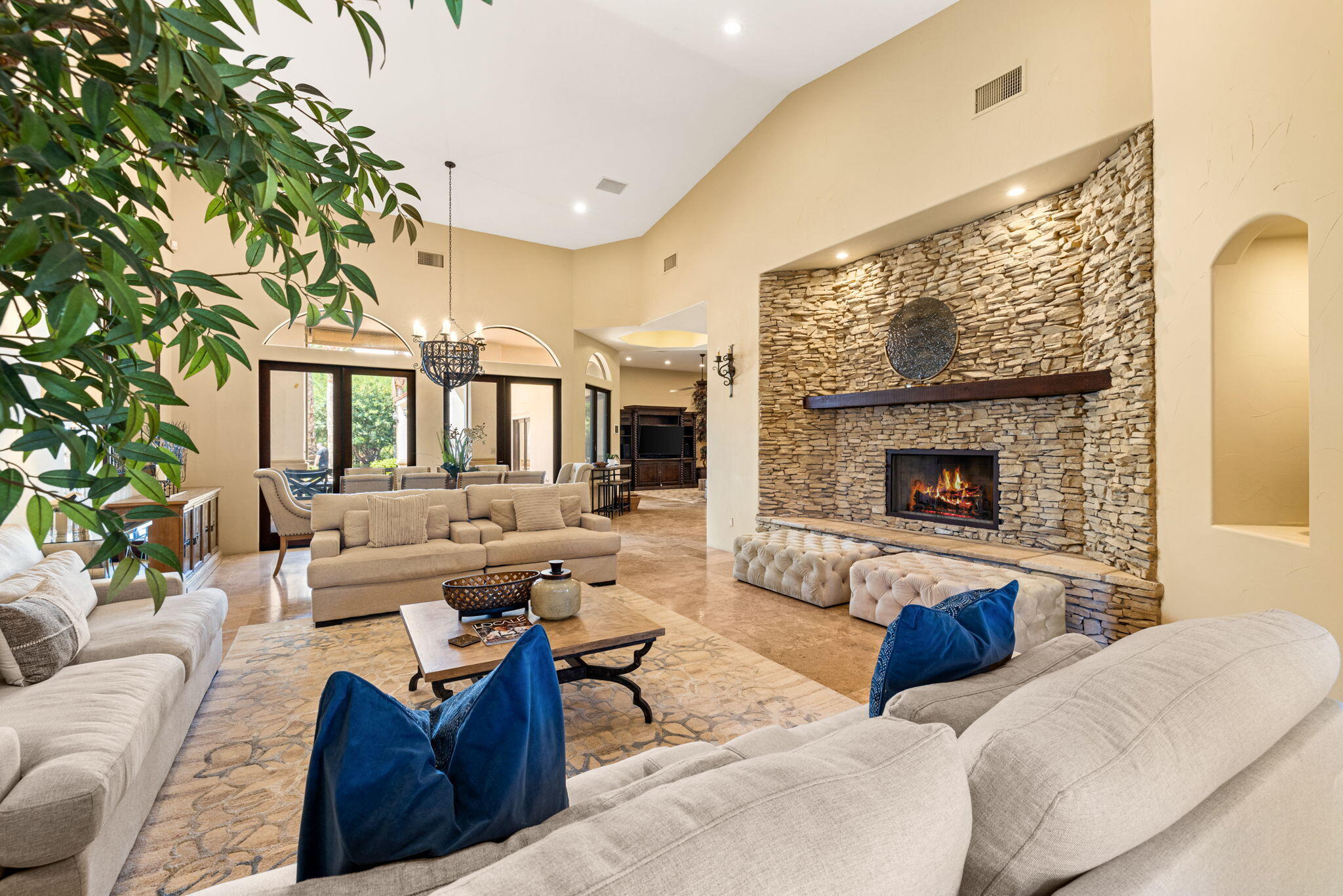 72033 Clancy Lane Rancho Mirage, CA 92270 - Photo 25 of 83 a living room with furniture large window and a fireplace