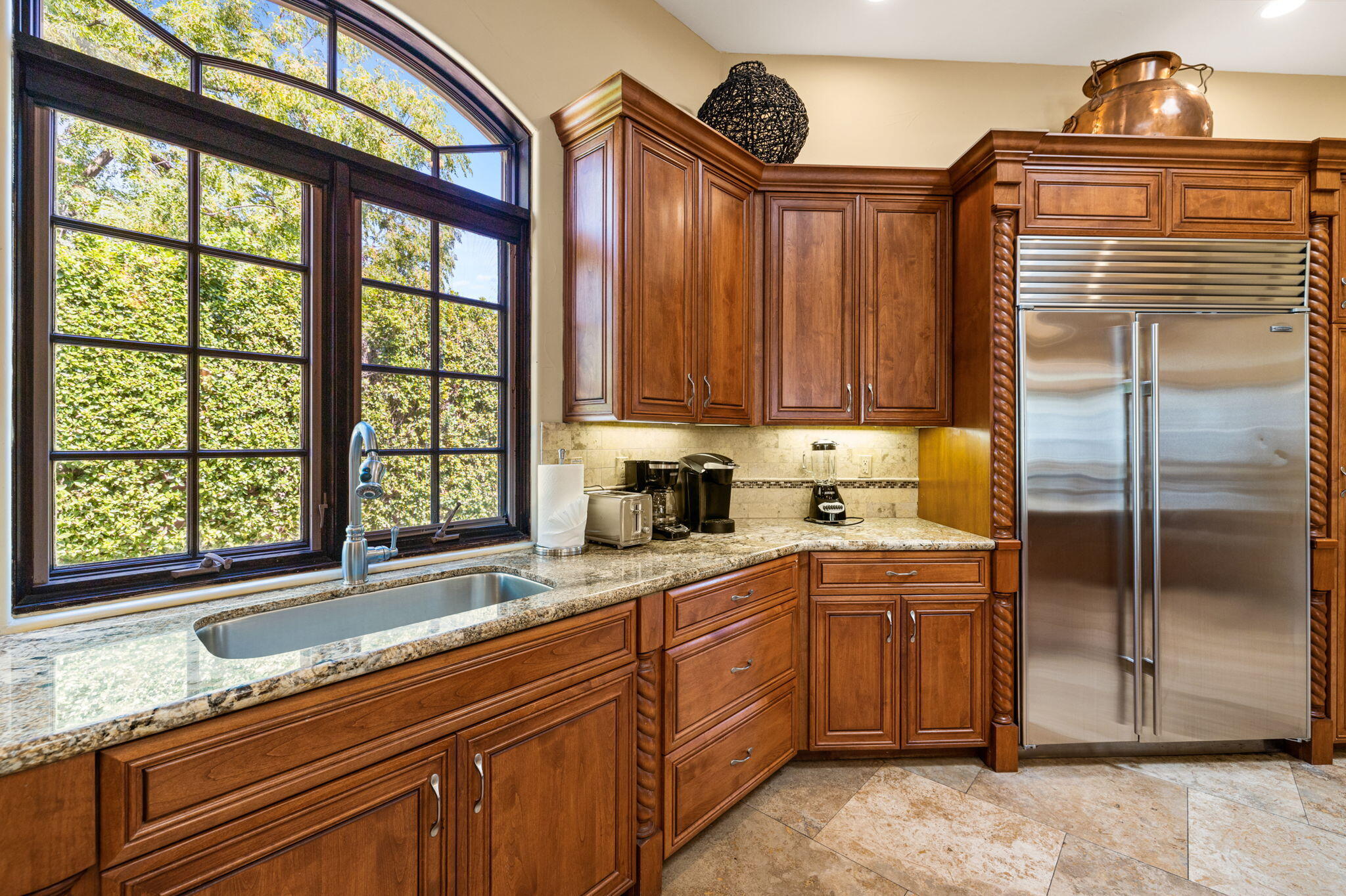 72033 Clancy Lane Rancho Mirage, CA 92270 - Photo 35 of 83 a kitchen with stainless steel appliances granite countertop a refrigerator and a sink