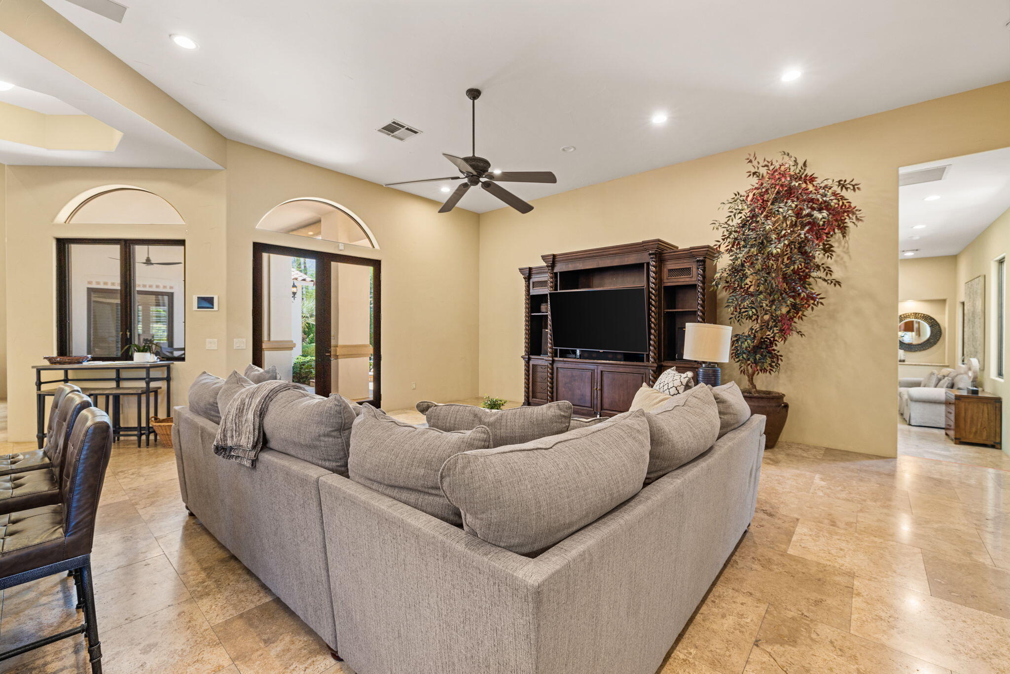 72033 Clancy Lane Rancho Mirage, CA 92270 - Photo 38 of 83 a living room with furniture and a flat screen tv